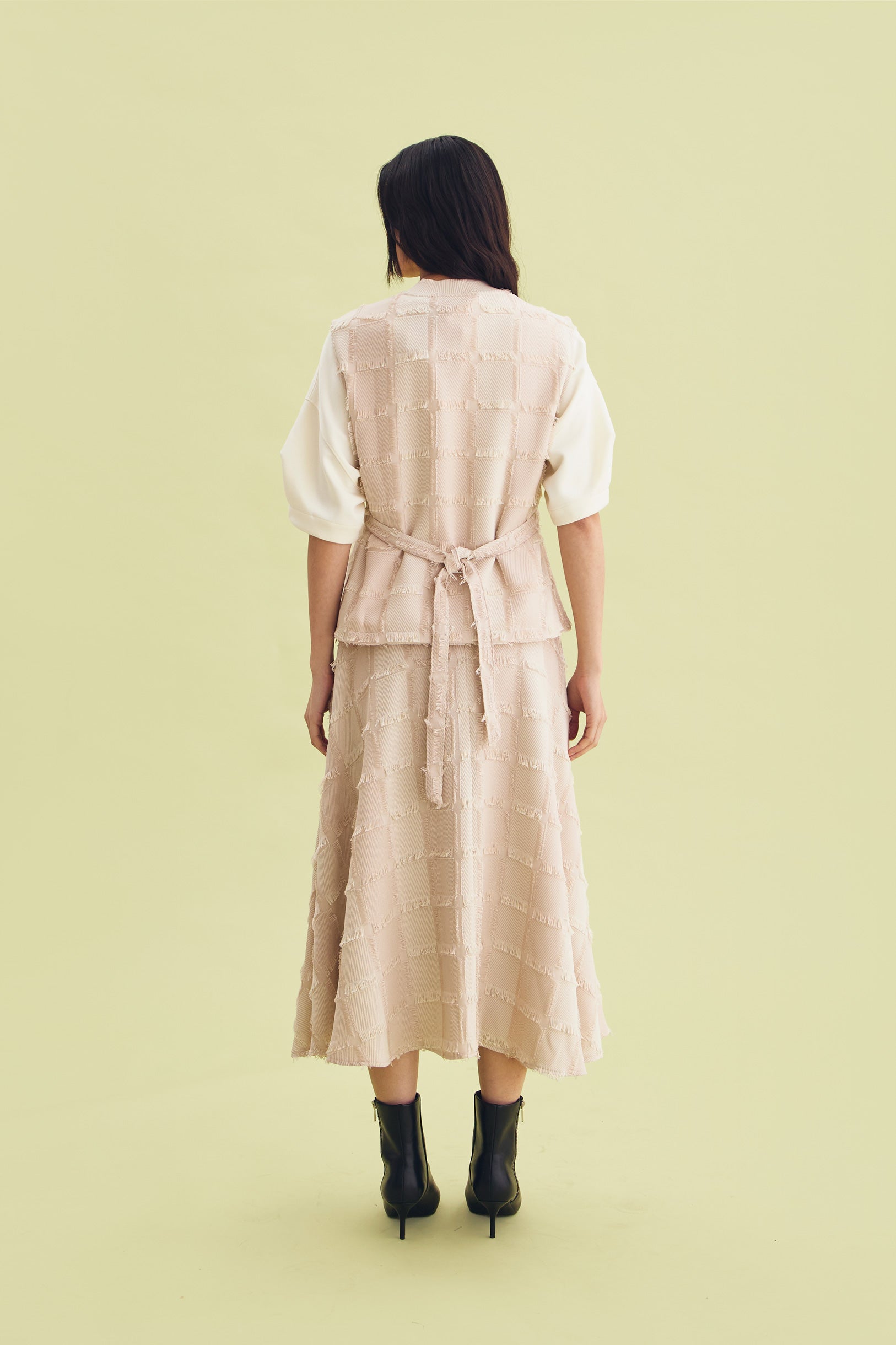 FEATHER VEST BEIGE - CALLIE FT. IRANI VIANZA