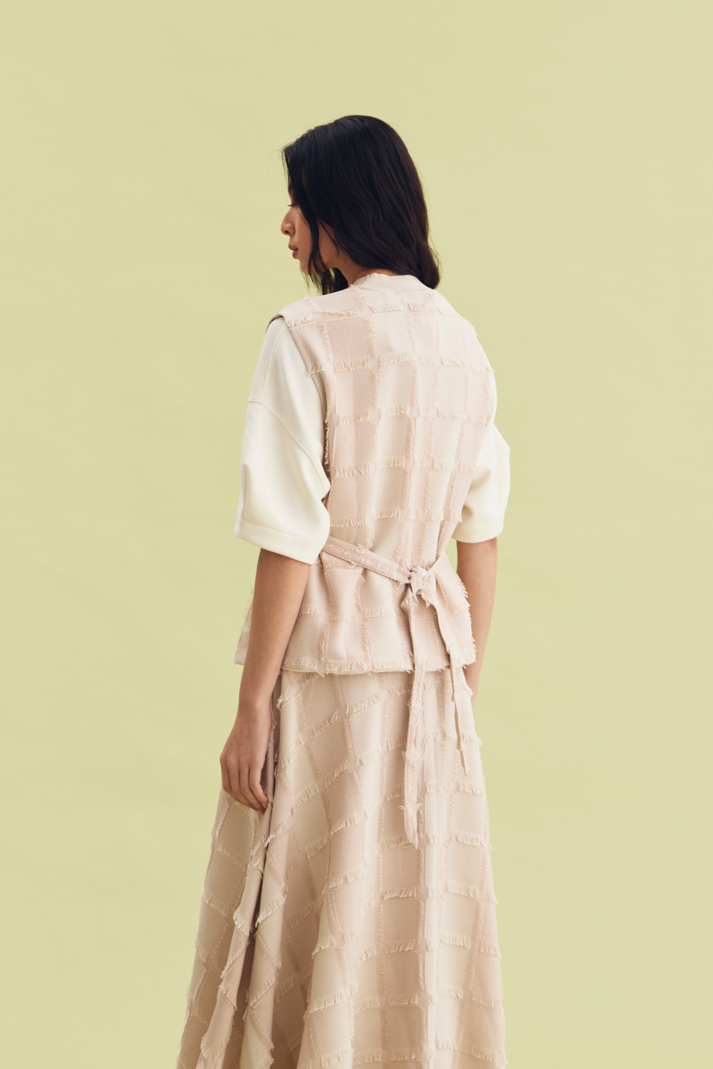 FEATHER VEST BEIGE - CALLIE FT. IRANI VIANZA